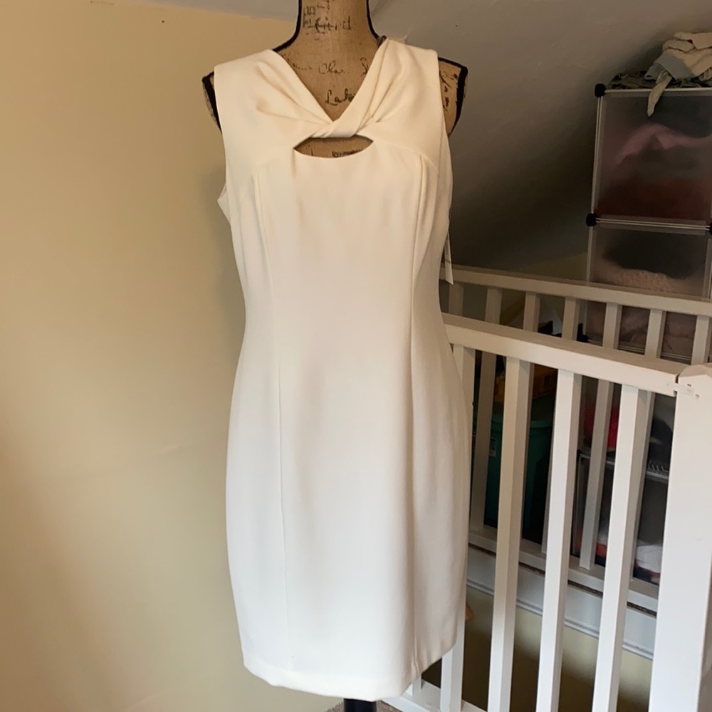 NWT ivory peek a boo neck line dress